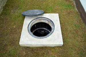 Open grease trap that is ready to be cleaned