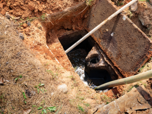 Septic tank technicians provide septic tank maintenance services at property outside Portland OR